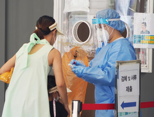 신규 확진자 1674명… 23일째 네자릿수